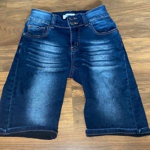 Knee length jean shorts . Mid rise